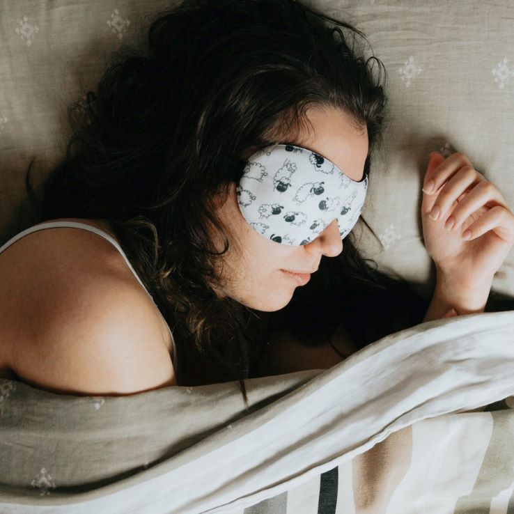 Aromatherapy for sleep, woman in sleeping mask